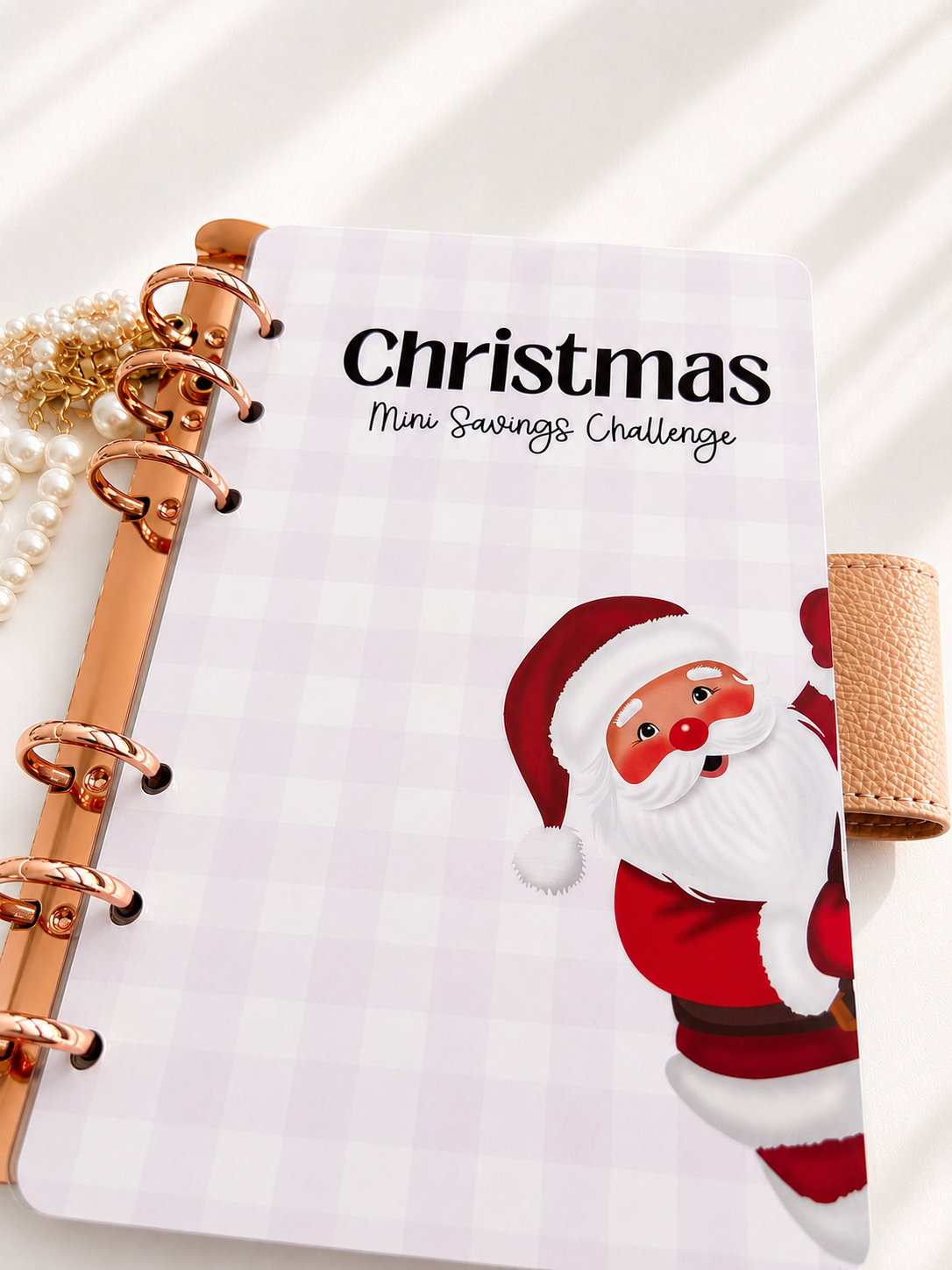 Notebook with a Christmas design featuring Santa Claus on a white background